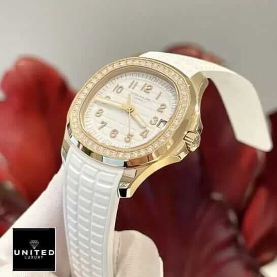 Pathttek Philithtppe Aquanaut Luce Diamond Bezel Gold Case Replica red background