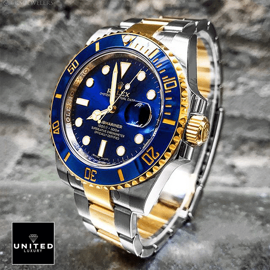 rolthtex Submariner Date Two Tone Blue Dial 16613 Replica on the table