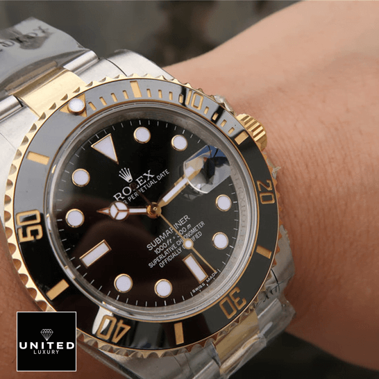 rolthtex Submariner Date 16803 Two Tone Black Dial Replica on the wrist