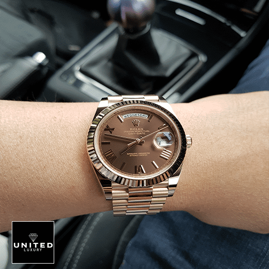 rolthtex Day-Date 40 228235-0002 Brown Dial with diamonds Replica on his arm