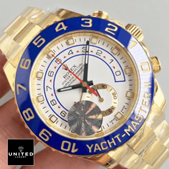 rolthtex Yatch Master 116688 II Yellow Gold White Dial Replica on the ahnd