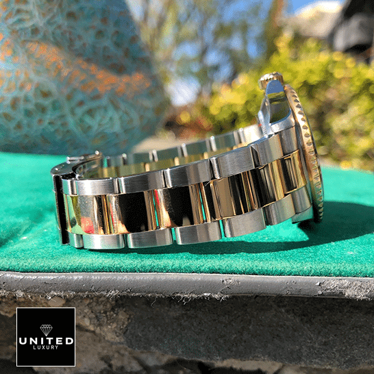 rolthtex Submariner 16613 Serti Two Tone Stainless Steel Gold Diamond Replica on the table