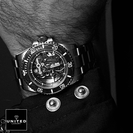 rolthtex Oyster Perpetual Skeleton Replica on a man's wrist