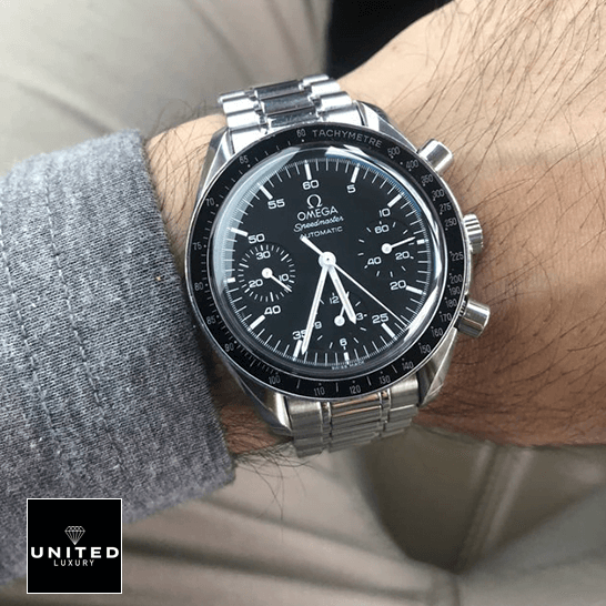 omethtga Speedmaster Automatic Black Dial Replica on the man wrist
