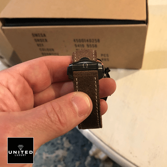 omethtga 311.92.44.51 Brown Leather Bracelet Replica on the hand