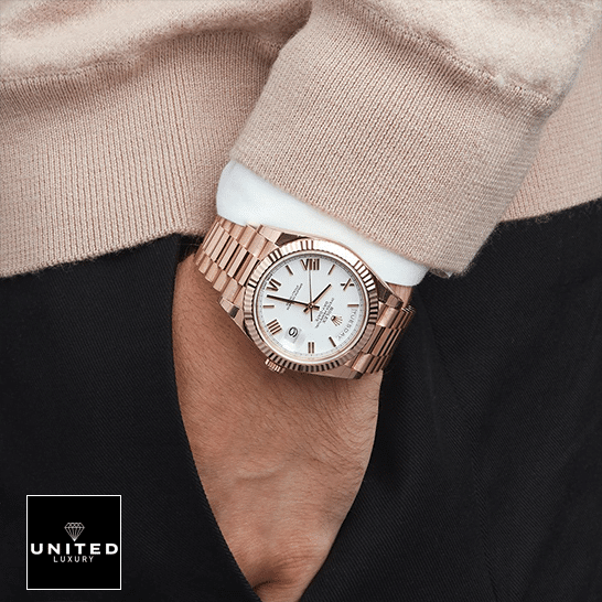 rolthtex Day-Date 228235 Rose Gold Replica on is arm
