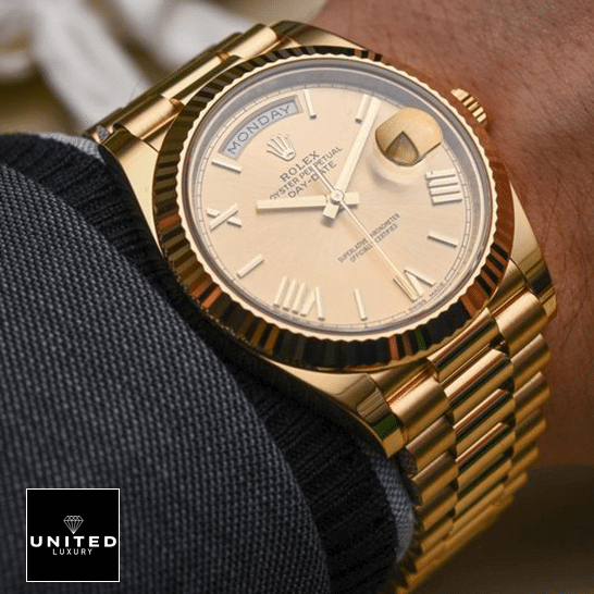 rolthtex Day-Date II 228238-0007 Yellow Gold Romen Numerial Dial Replica on is arm