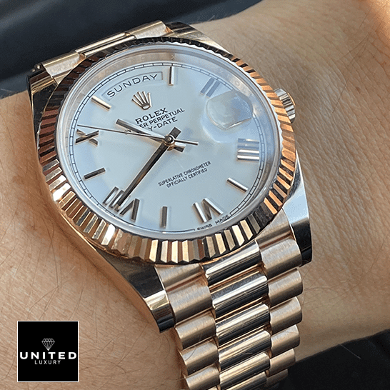 rolthtex Day-Date President 118235f-0024 White Dial Replica on his arm