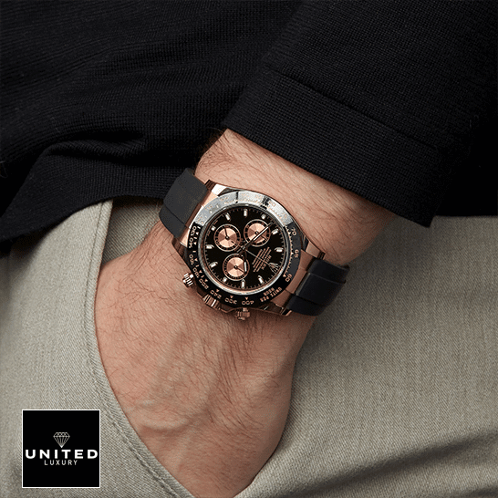 rolthtex Daytona Cosmograph Black Rose Gold Dial 116515LN-0012 Replica on his arm