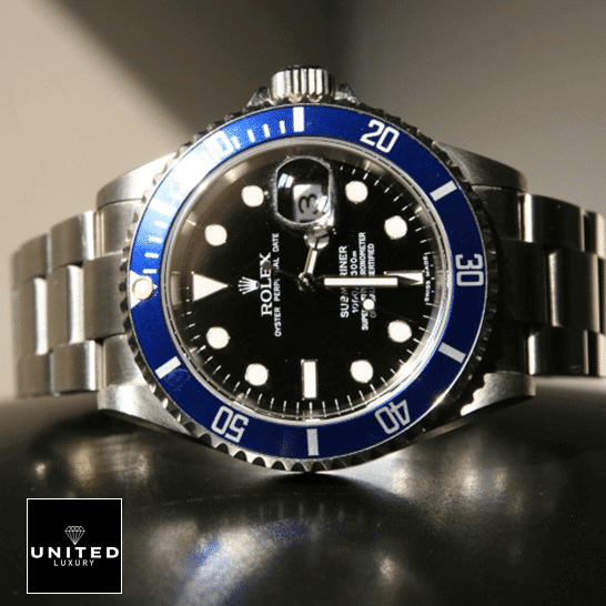 rolthtex Submariner Date 16610 Black Dial Oyster Replica on the table