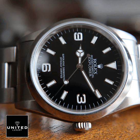 rolthtex Explorer 124270 Stainless Steel Case and Bezel Replica on a wooden table