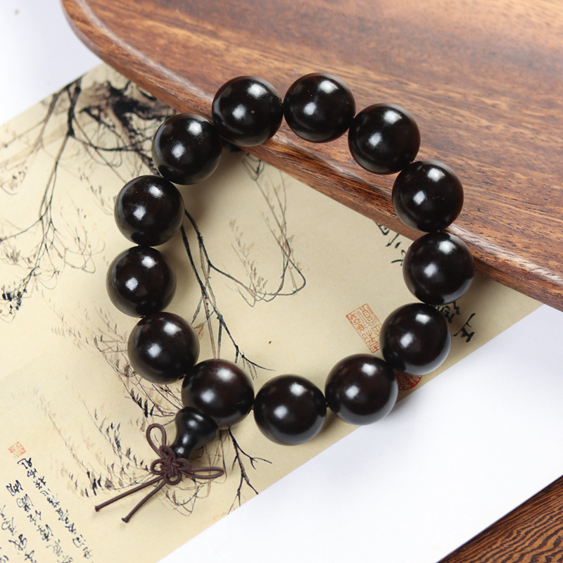 Selected Old Material Ebony Single Strand Bracelet