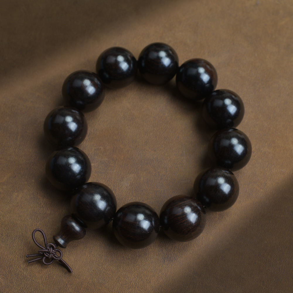 Selected Old Material Ebony Single Strand Bracelet