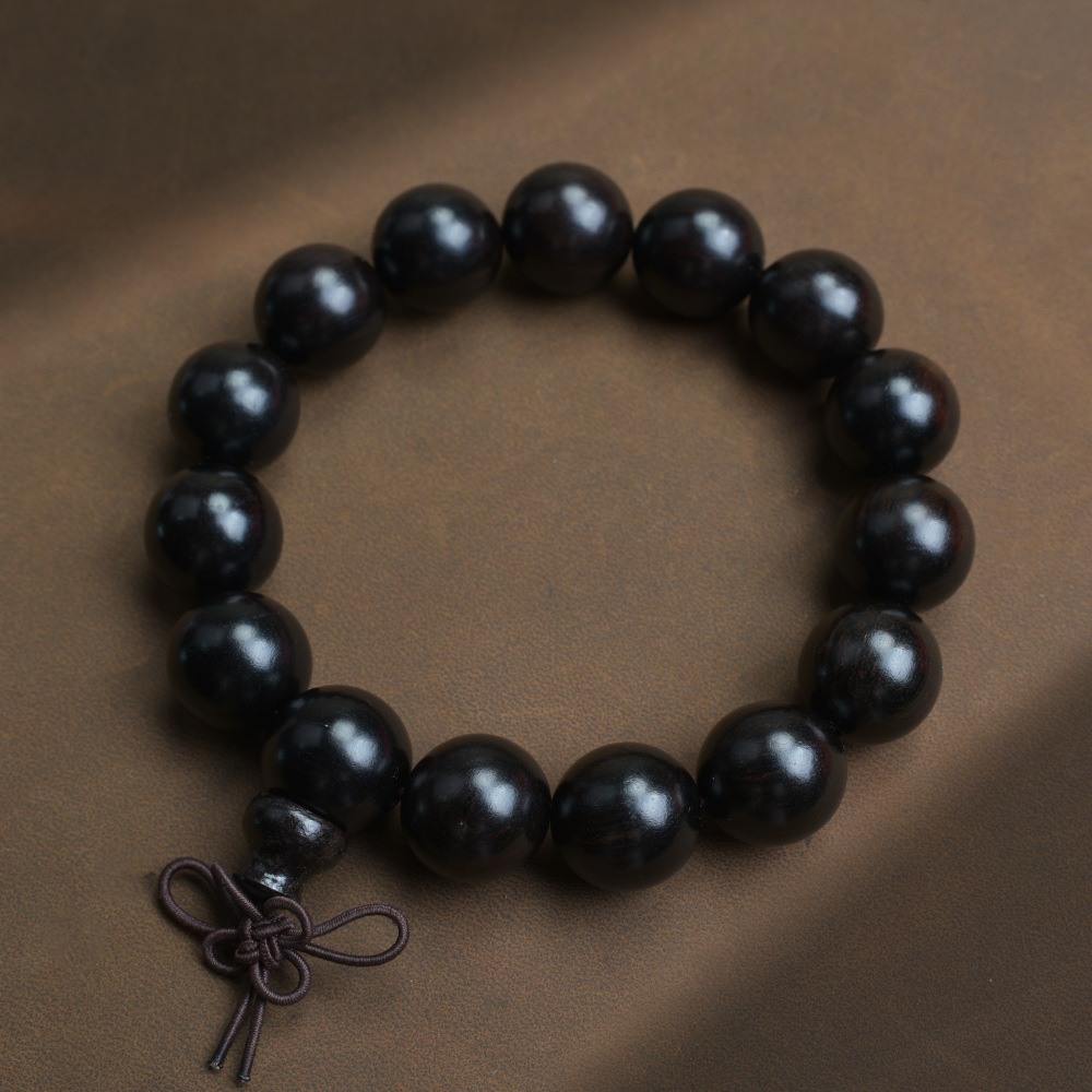 Selected Old Material Ebony Single Strand Bracelet