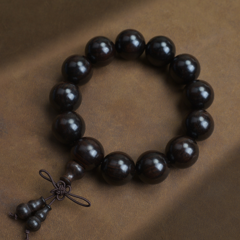 Selected Old Material Ebony Single Strand Bracelet