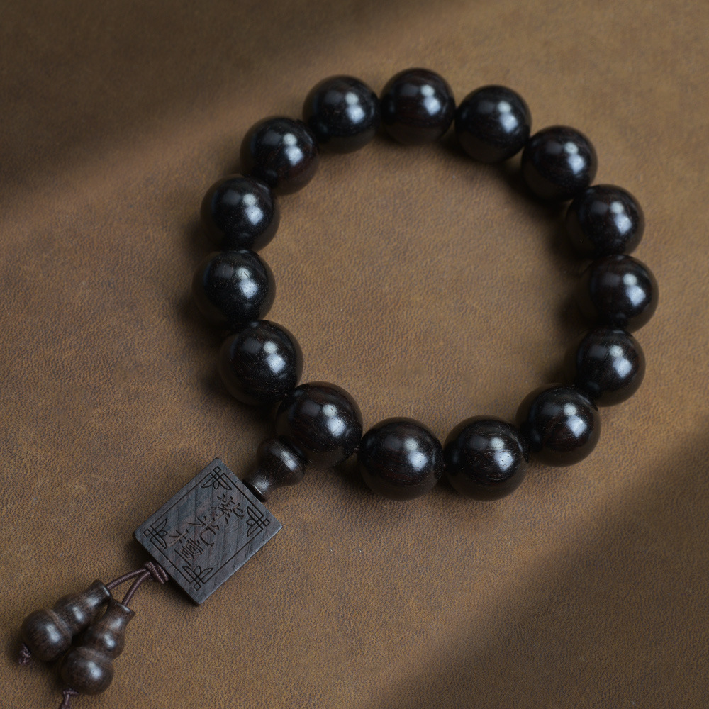 Selected Old Material Ebony Single Strand Bracelet