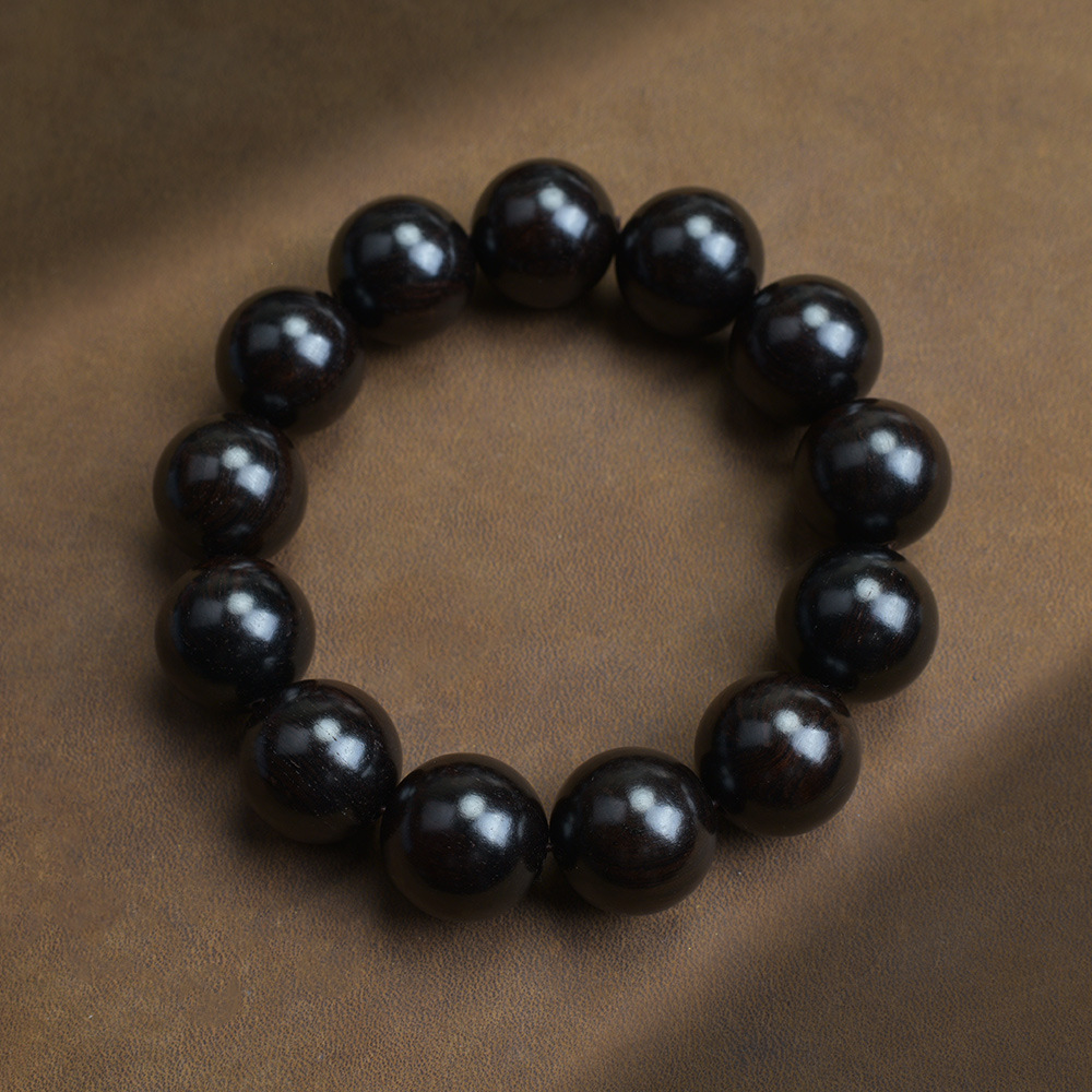 Selected Old Material Ebony Single Strand Bracelet