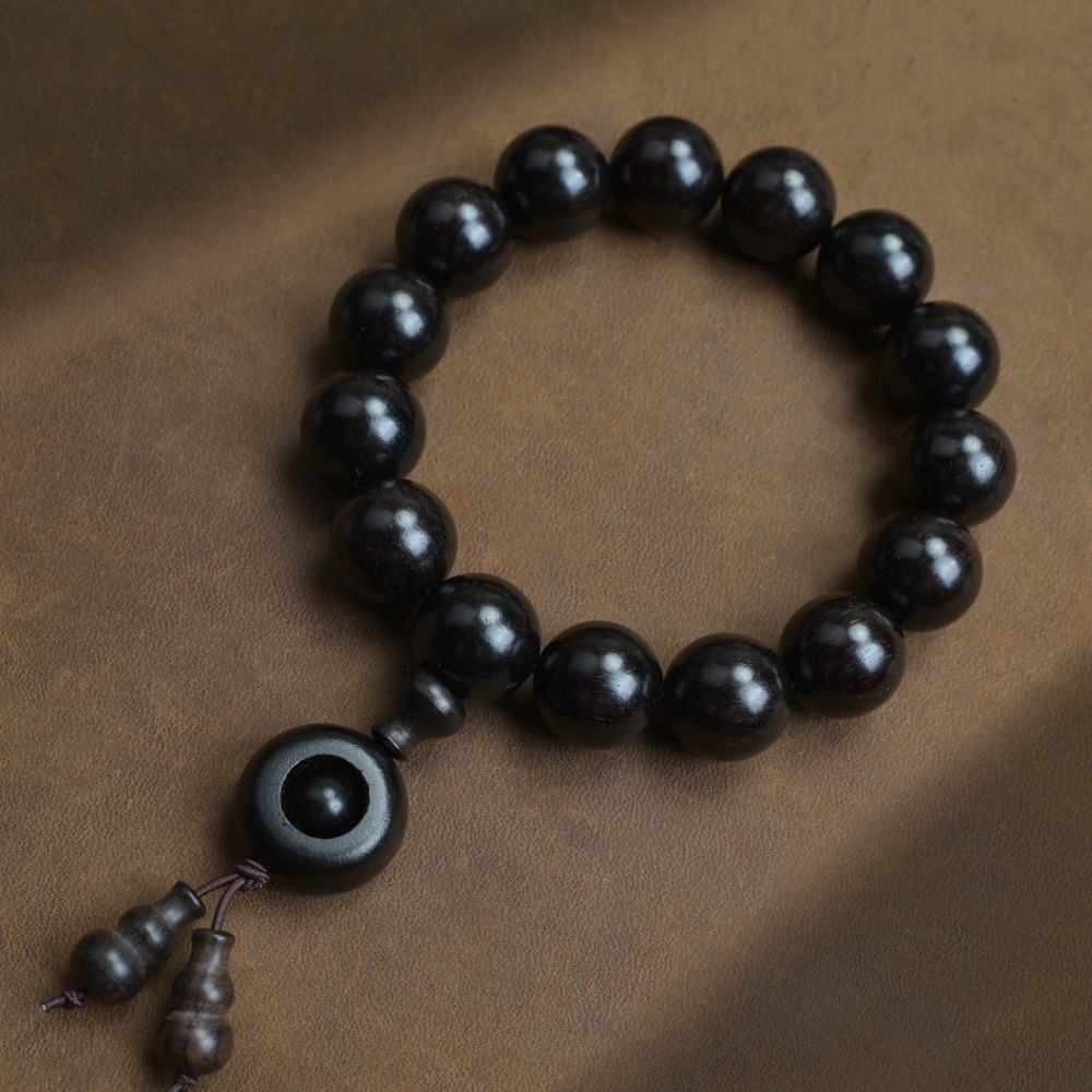 Selected Old Material Ebony Single Strand Bracelet