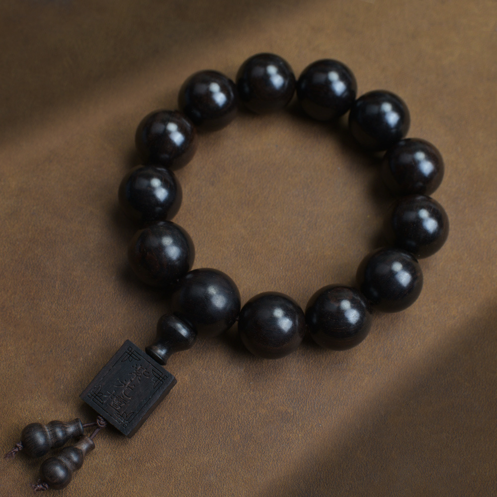 Selected Old Material Ebony Single Strand Bracelet