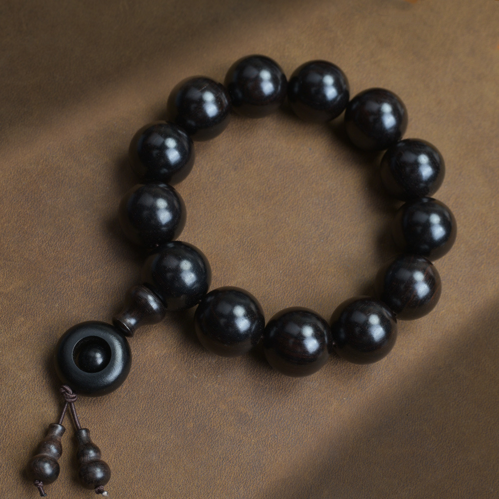 Selected Old Material Ebony Single Strand Bracelet