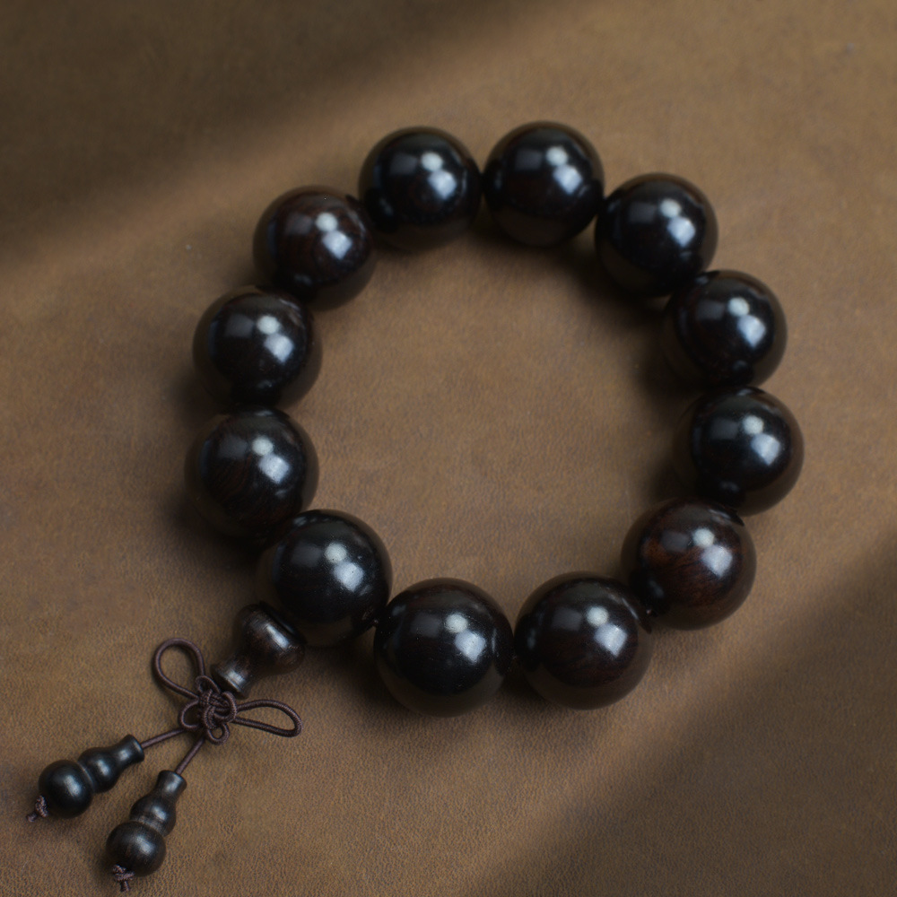 Selected Old Material Ebony Single Strand Bracelet