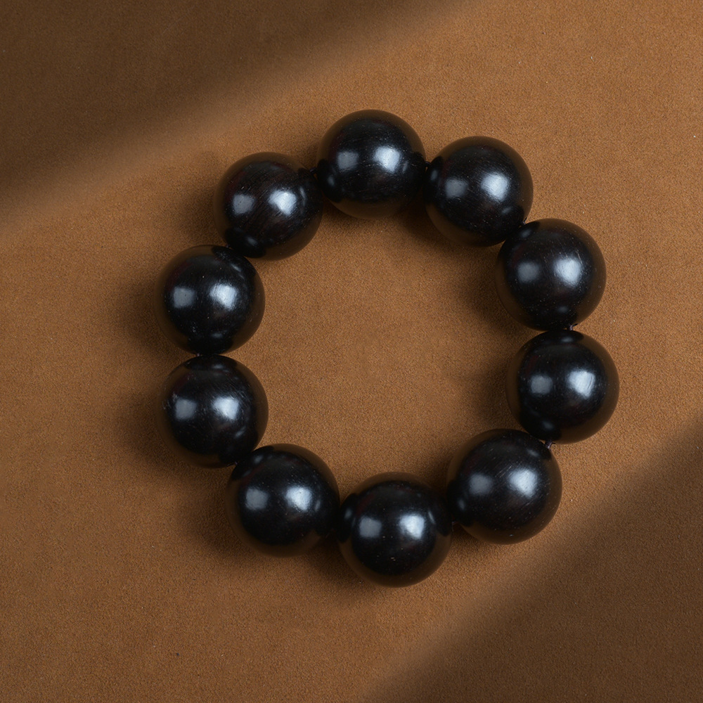Selected Old Material Ebony Single Strand Bracelet