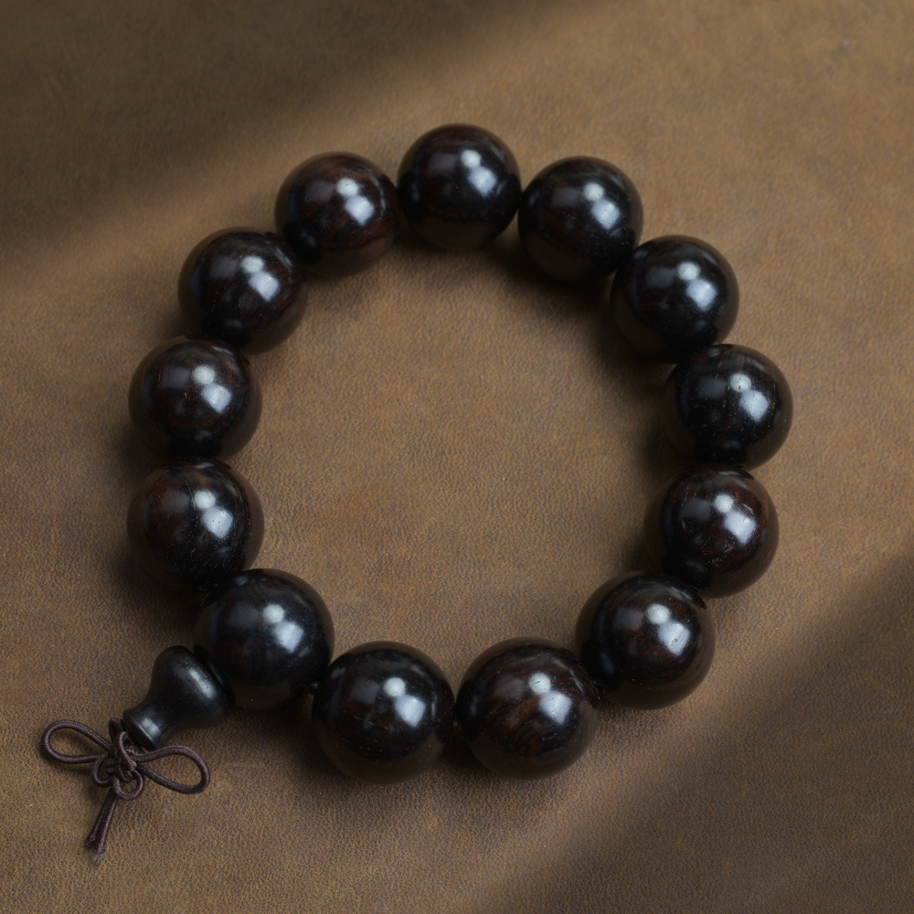 Selected Old Material Ebony Single Strand Bracelet