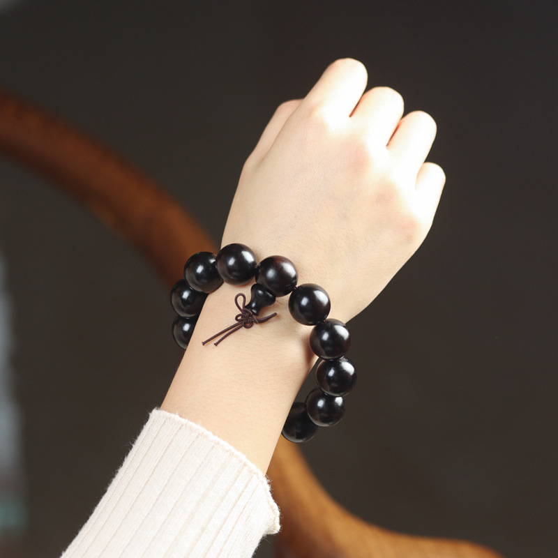 Selected Old Material Ebony Single Strand Bracelet
