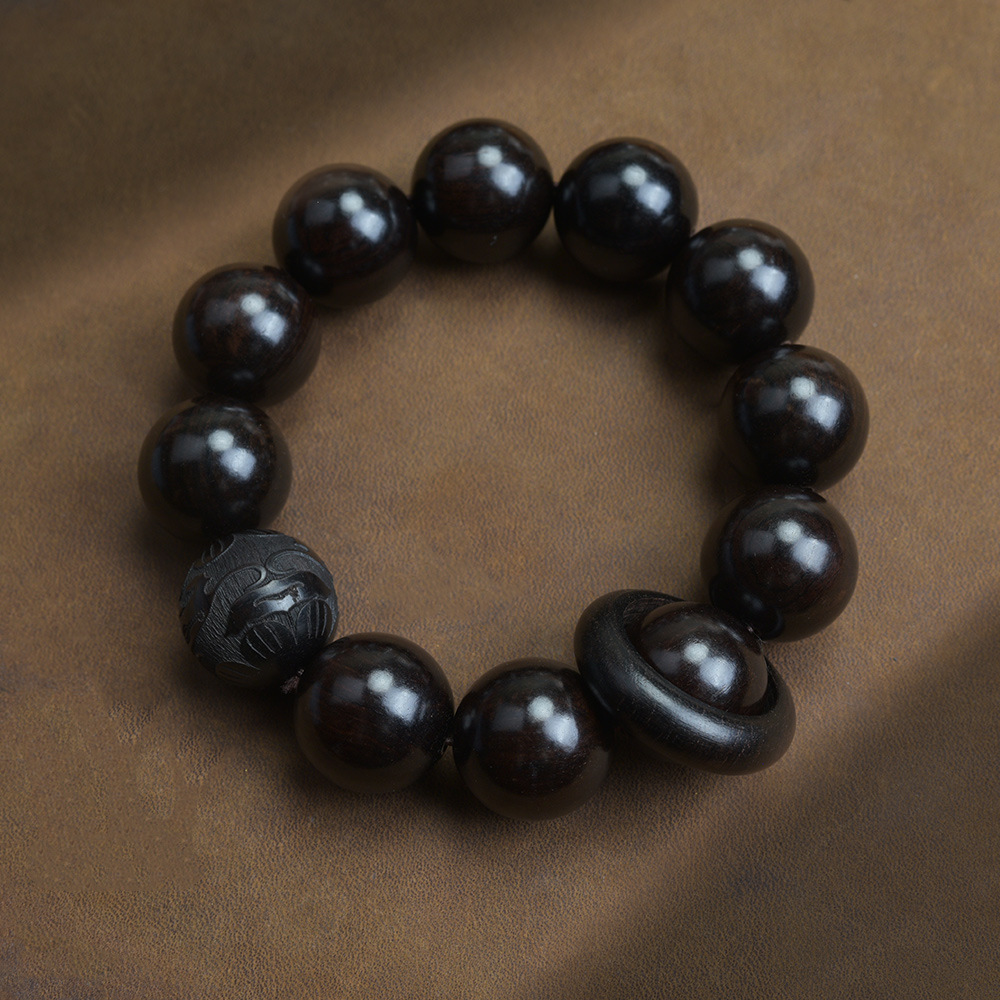 Selected Old Material Ebony Single Strand Bracelet