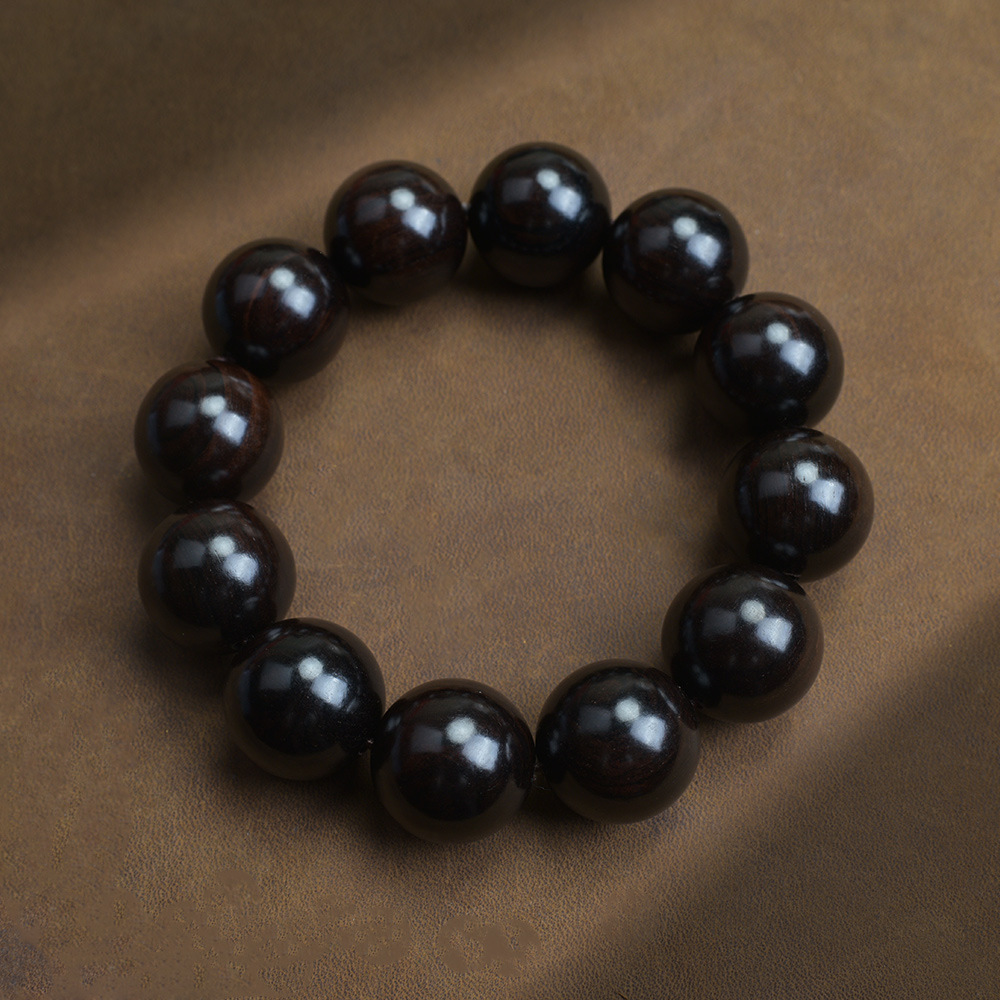 Selected Old Material Ebony Single Strand Bracelet