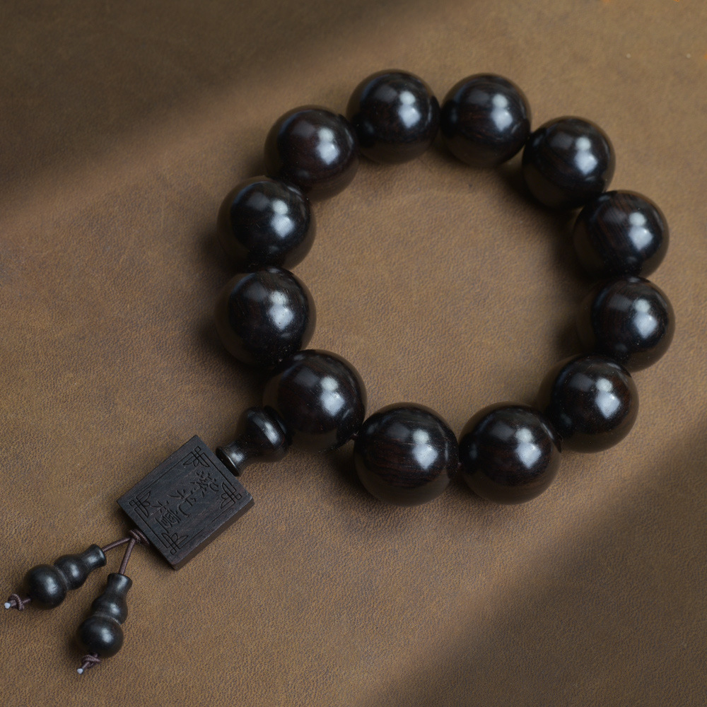 Selected Old Material Ebony Single Strand Bracelet