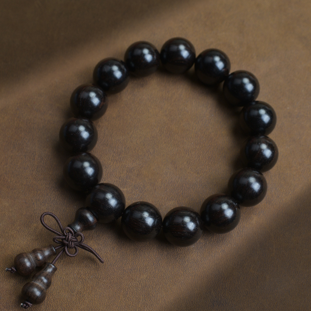 Selected Old Material Ebony Single Strand Bracelet