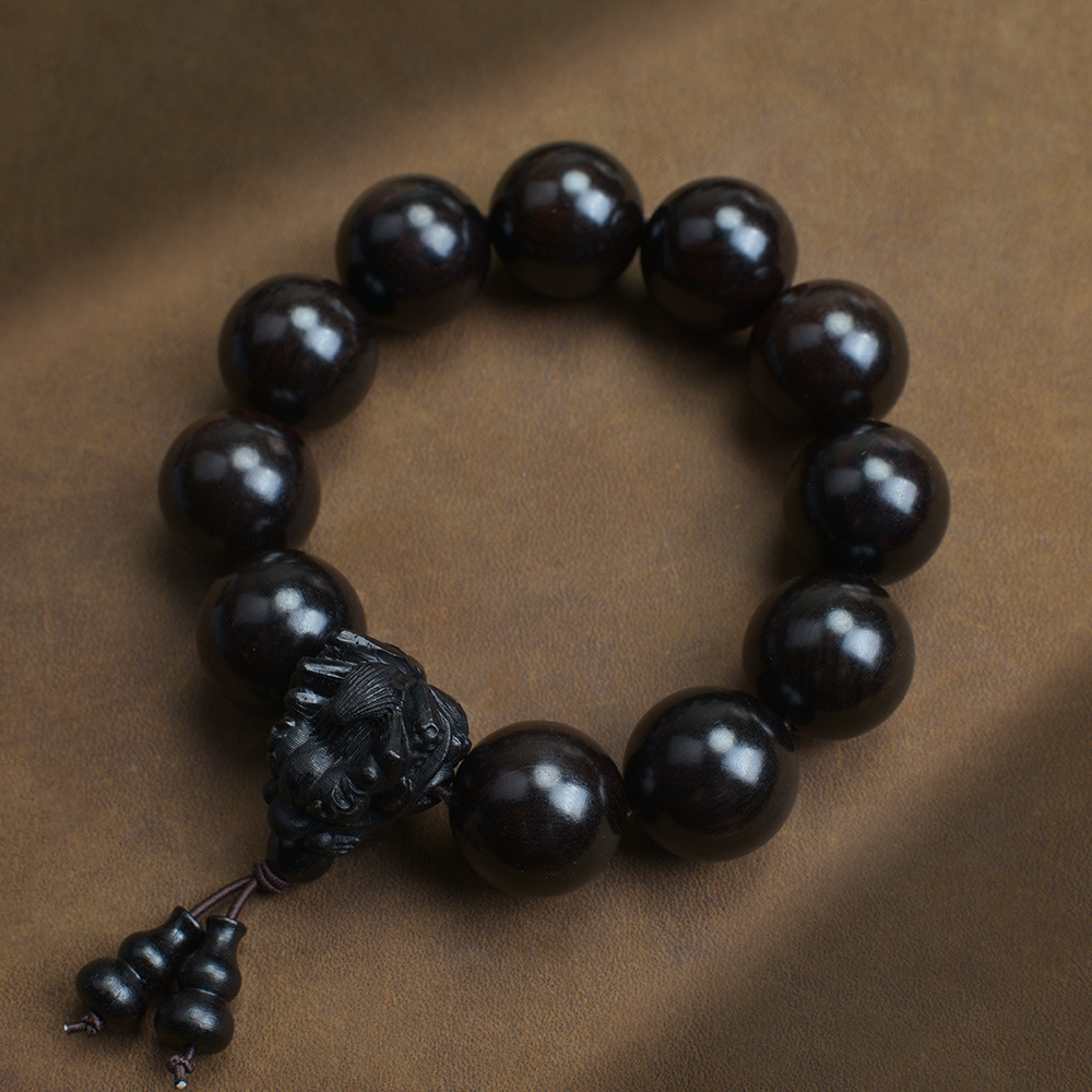 Selected Old Material Ebony Single Strand Bracelet