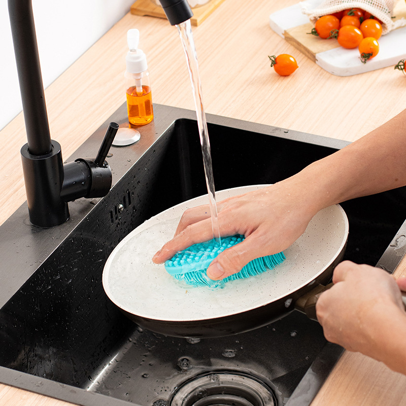 Double sided dishwashing brush