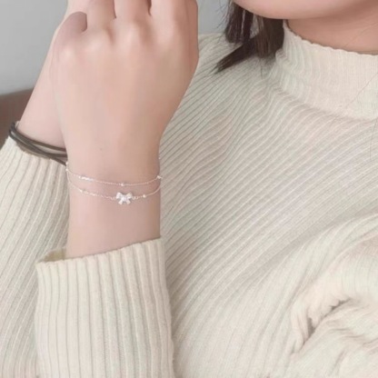 Bow - Accented Silver Bracelet | Double - Layered Whimsy for Your Wrist
