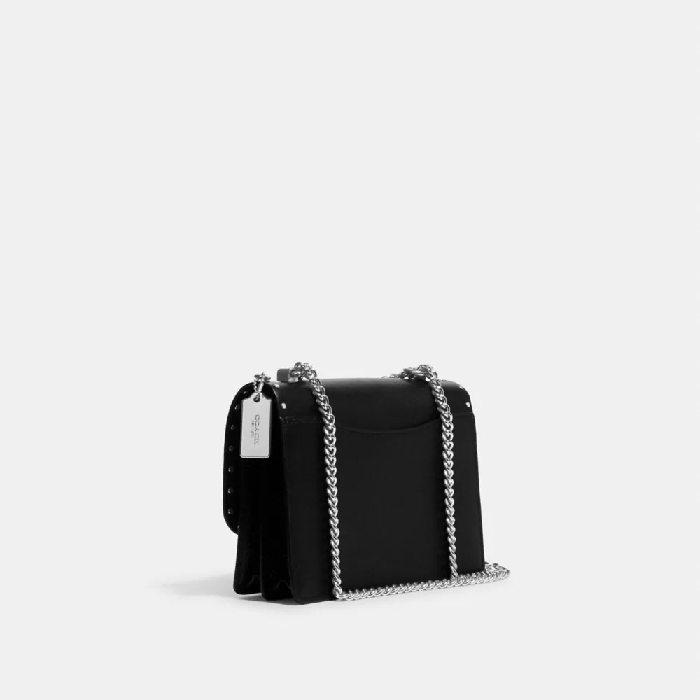 Klare Crossbody Bag In Signature Canvas With Rivets