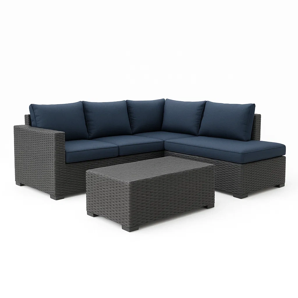 Set salotto angolare in polyrattan con cuscini blu e tavolino abbinato