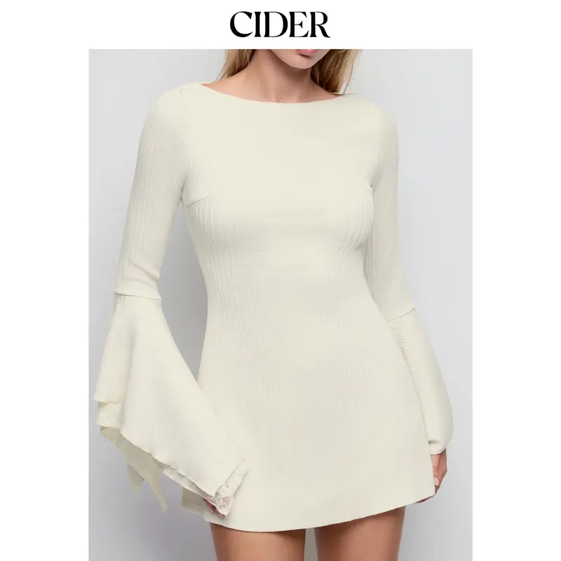 Women’s A-line mini dress, crafted from a textured fabric and featuring a boat neckline, flared sleeves, and lace panel detailing.