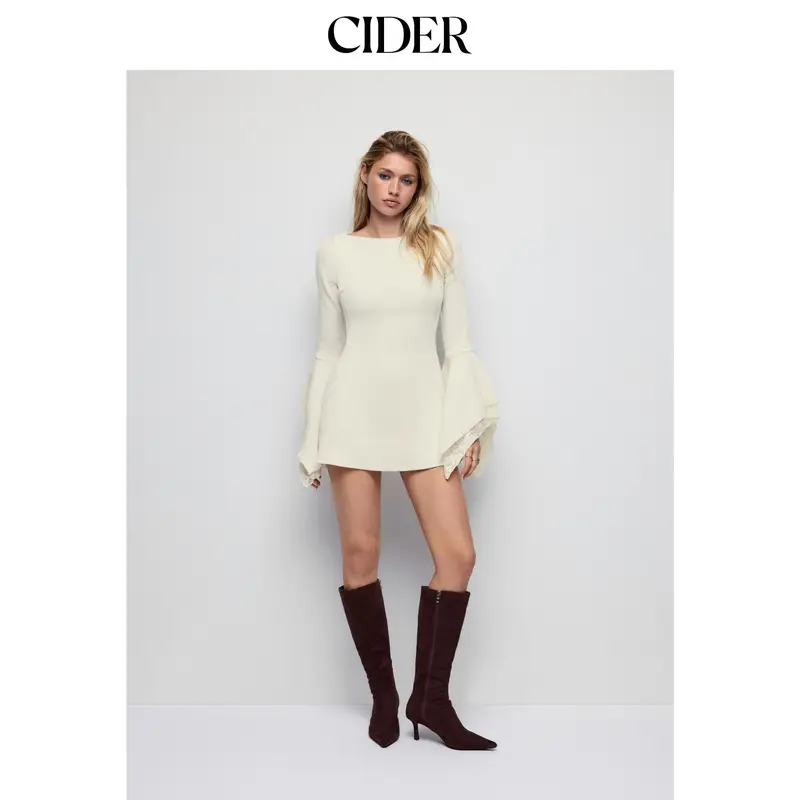 Women’s A-line mini dress, crafted from a textured fabric and featuring a boat neckline, flared sleeves, and lace panel detailing.