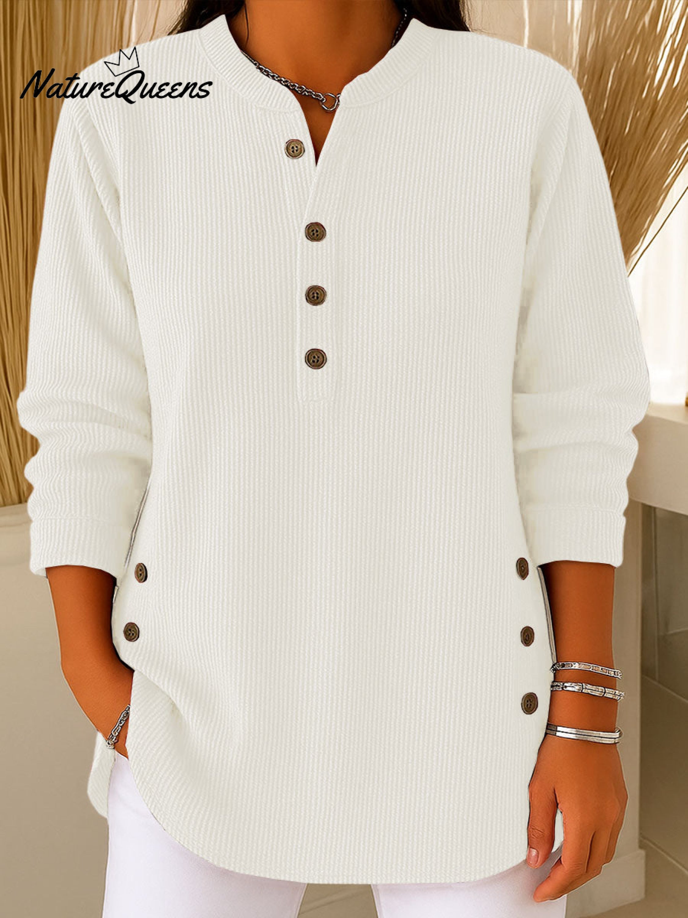 Pull en maille ample à manches longues et col rond de couleur unie pour femme