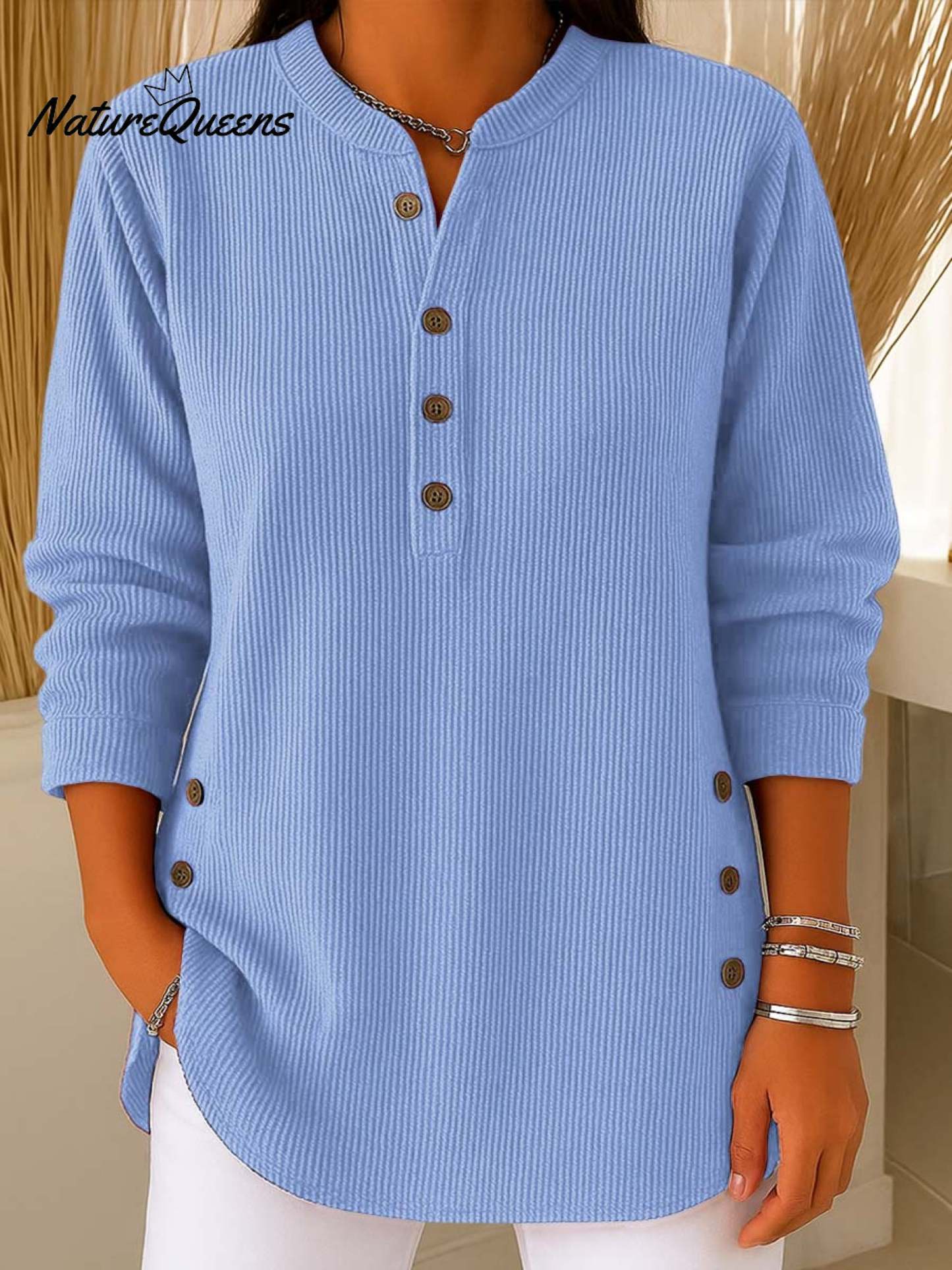 Pull en maille ample à manches longues et col rond de couleur unie pour femme