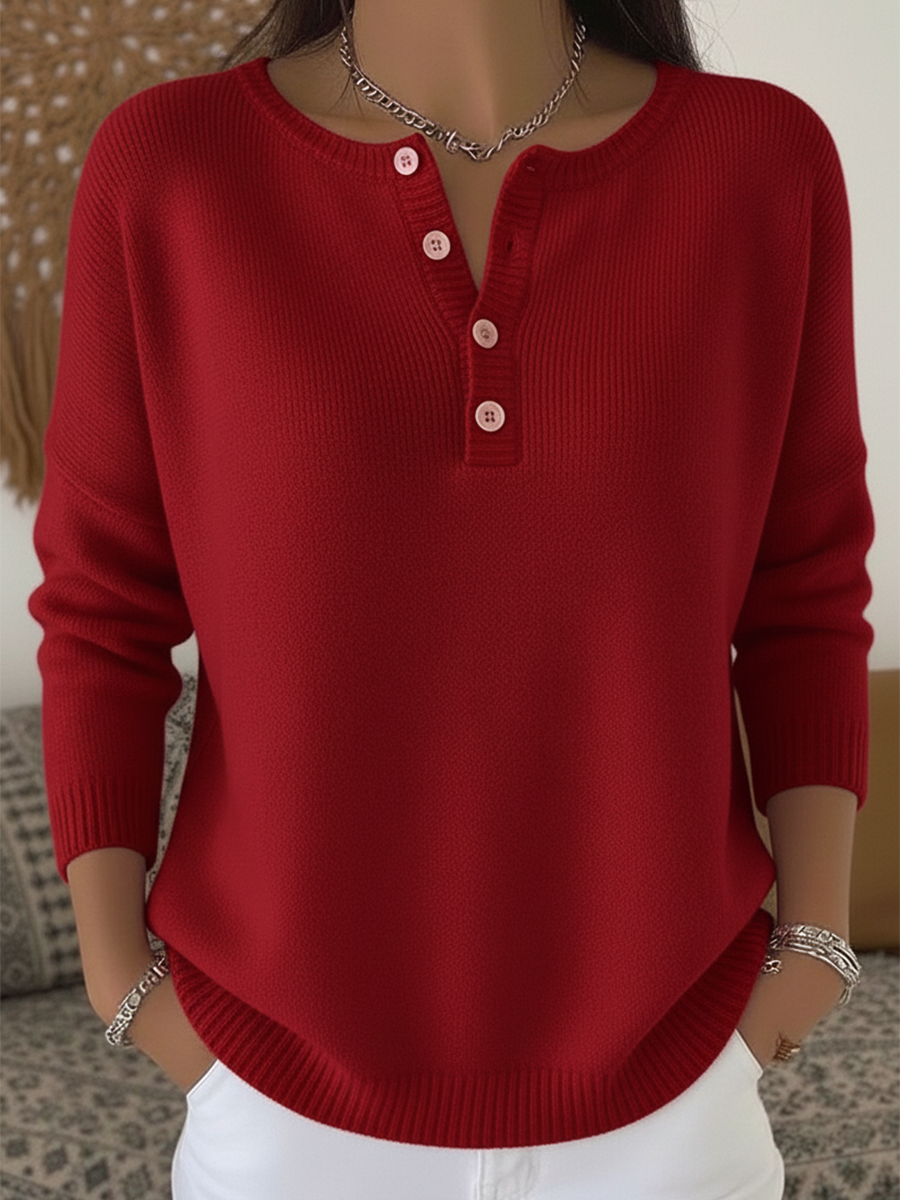 Haut pull pour femme à col Henley, de couleur unie et en matière douce.