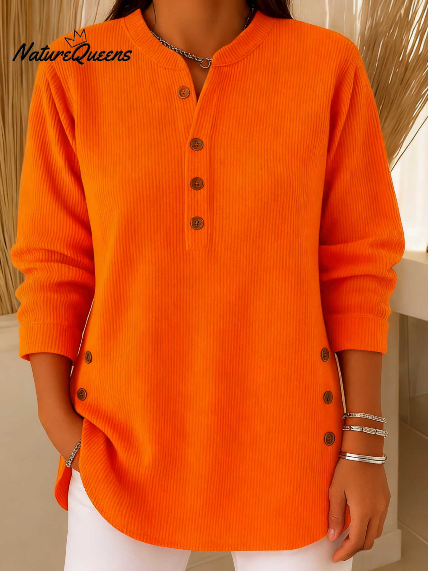 Pull en maille ample à manches longues et col rond de couleur unie pour femme