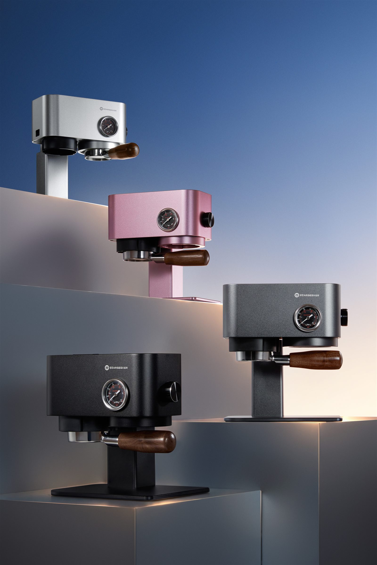 Omni58X adjustable espresso machines displayed in four finishes