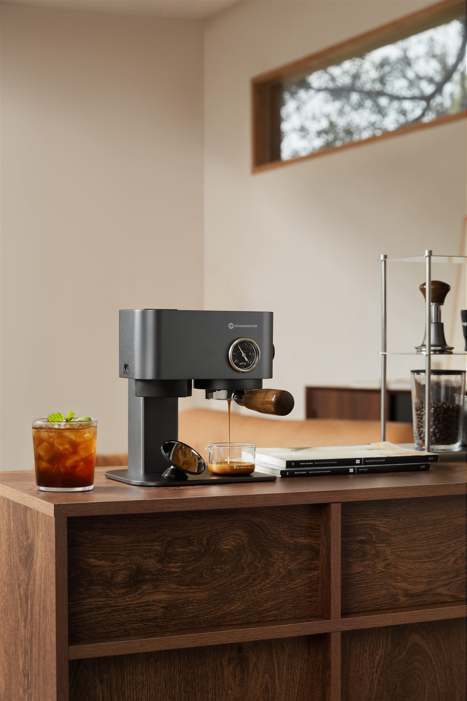 Graphite Omni58X espresso machine in a home coffee corner