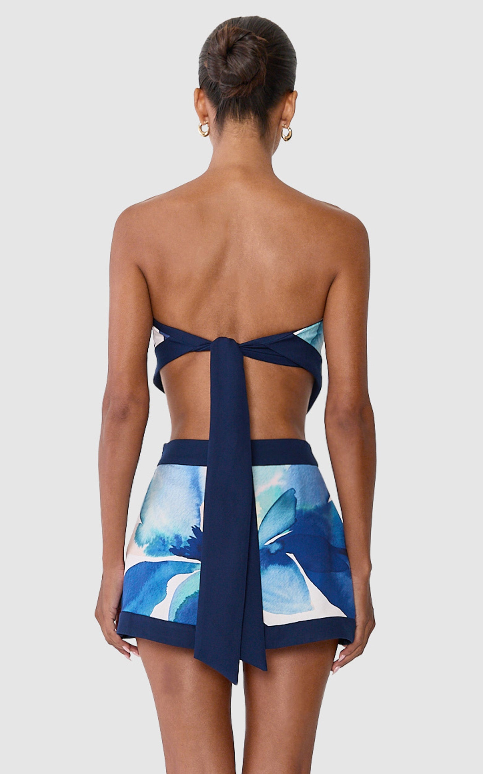 Anouk Skort - A Line Wrap Detail Mini Skort in Navy Watercolour Floral Print - View 6