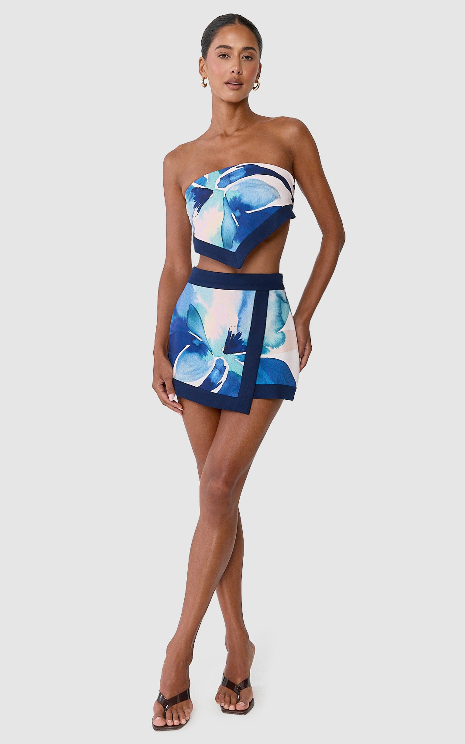 Anouk Skort - A Line Wrap Detail Mini Skort in Navy Watercolour Floral Print - View 1