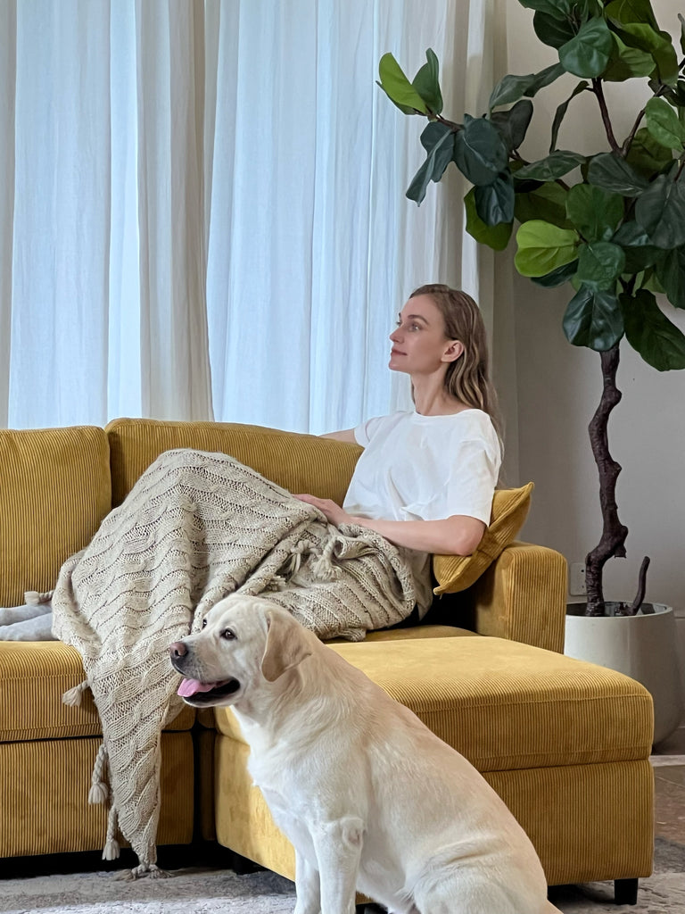 Owning a sectional sofa offers versatile comfort with its stylish design, practical functionality, and easy-to-clean materials, making it the perfect addition to any living space.