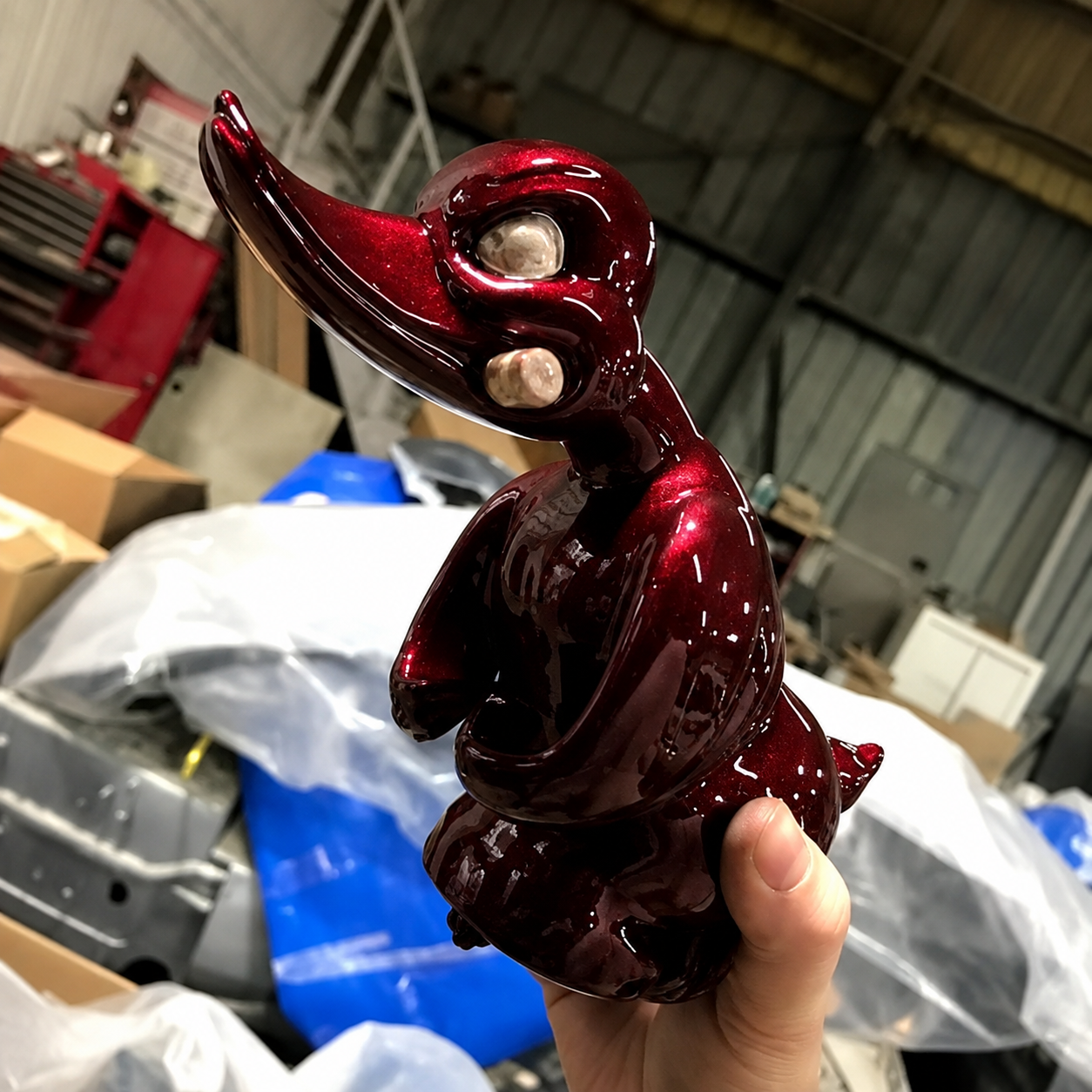 Burgundy duck hood ornament finish