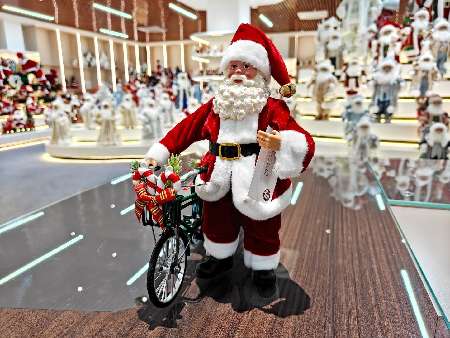 Xmas Handmade Resin Santa Claus Doll with a Tricycle Christmas Gift Handicraft Polyresin Santa Claus Indoor Decoration